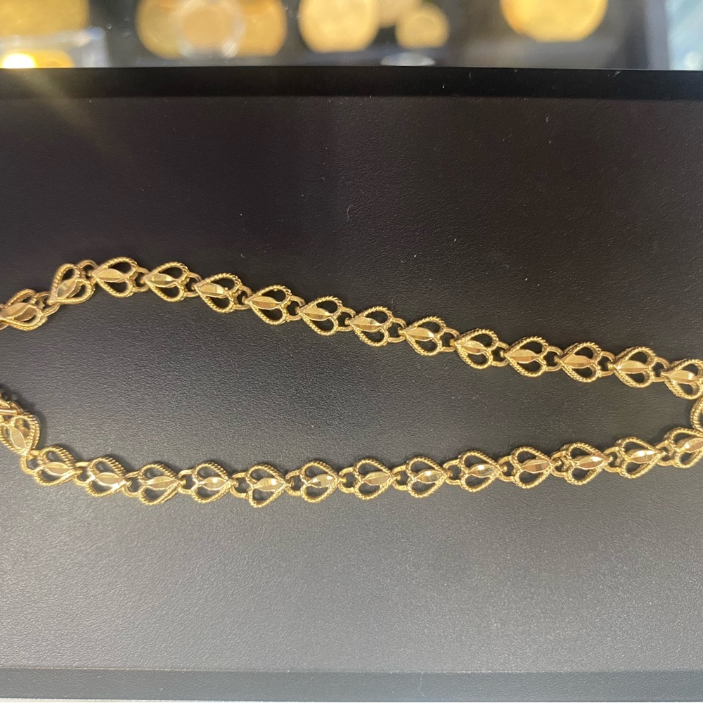 14 K solid gold heart bracelet